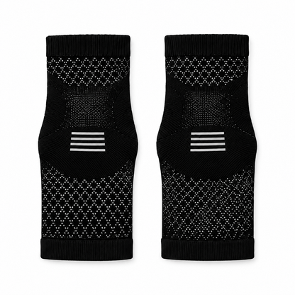 Two black and gray ankle sleeves laid flat on white.