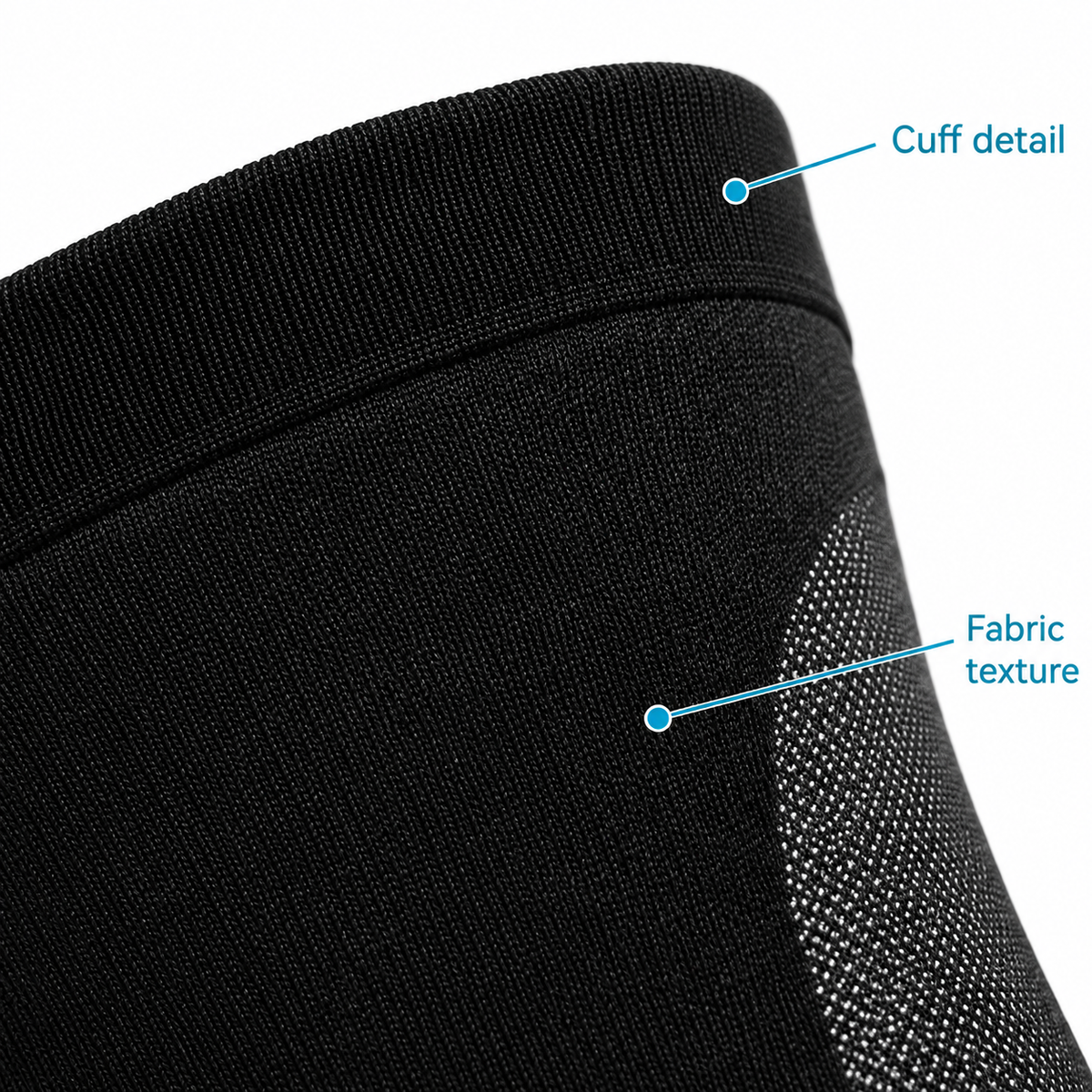 Close-up of the black sleeve cuff and fabric texture.